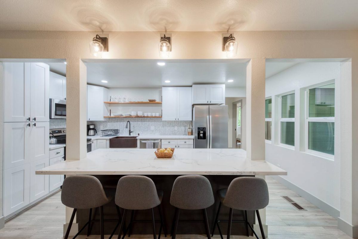 kitchen with 4 counter stools