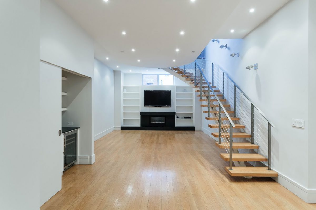 Empty living room with staircase