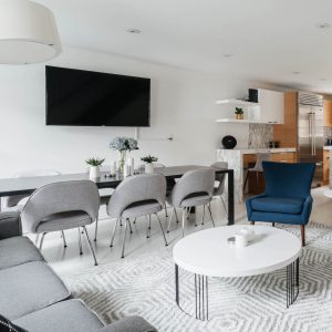 Open living dining room with white walls, New York Apartment