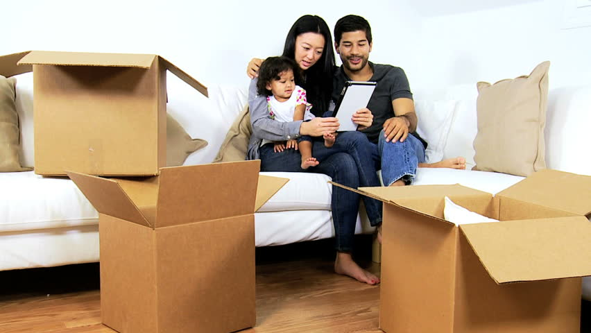 Moving as a family with boxes at home